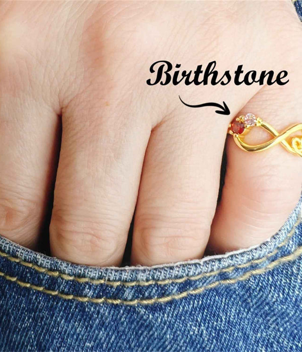 Gold-tone infinity knot ring with round multicolor gemstones, slim band